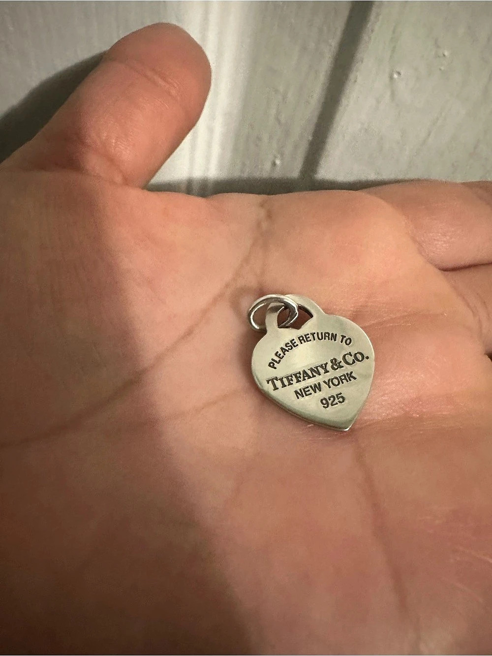 Tiffany & Co. Return to Tiffany Pink Enamel Heart Tag Charm. Silver